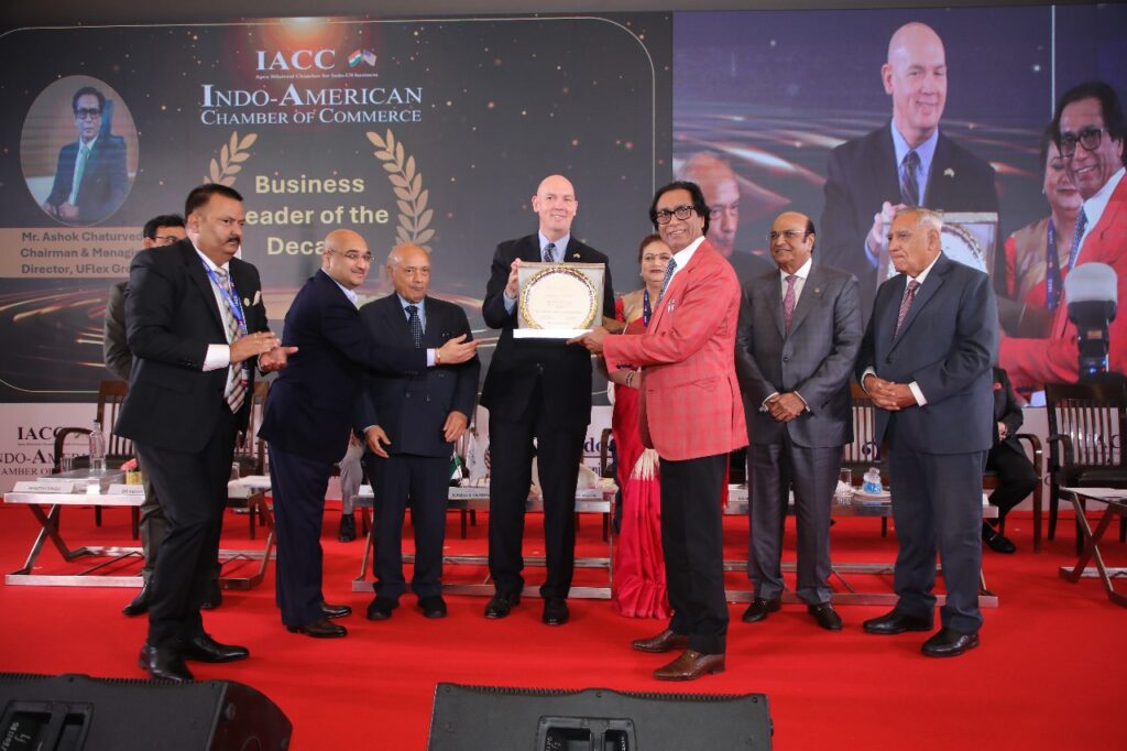 Mr. Ashok Chaturvedi, Founder, CMD, UFlex Limited Being Awarded Business leader of the Decade by Mr. Jorgan K. Andrews, Deputy Chief of Mission at the US Embassy